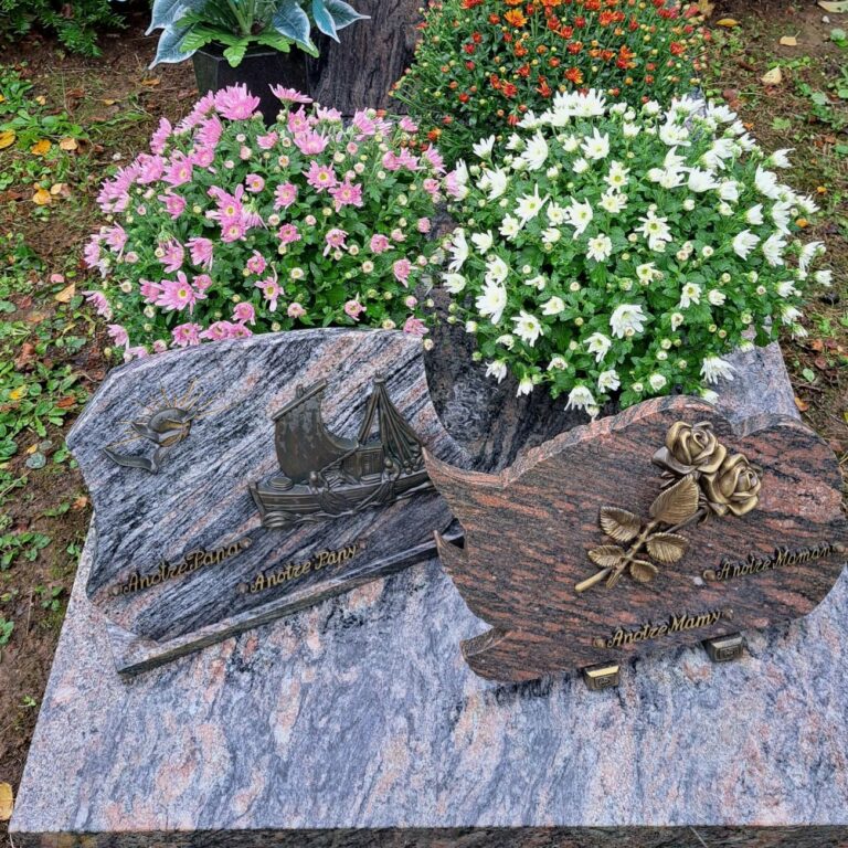 Pose de chrysanthèmes sur une cavurne